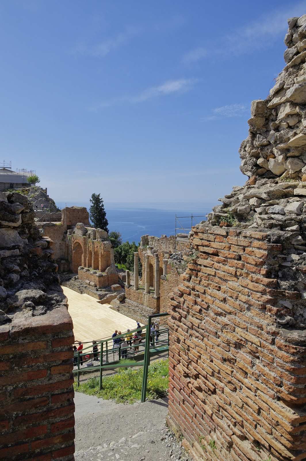The ancient theater at Taormina, Sicily, with the sea behind the stage, photographed in 2025.